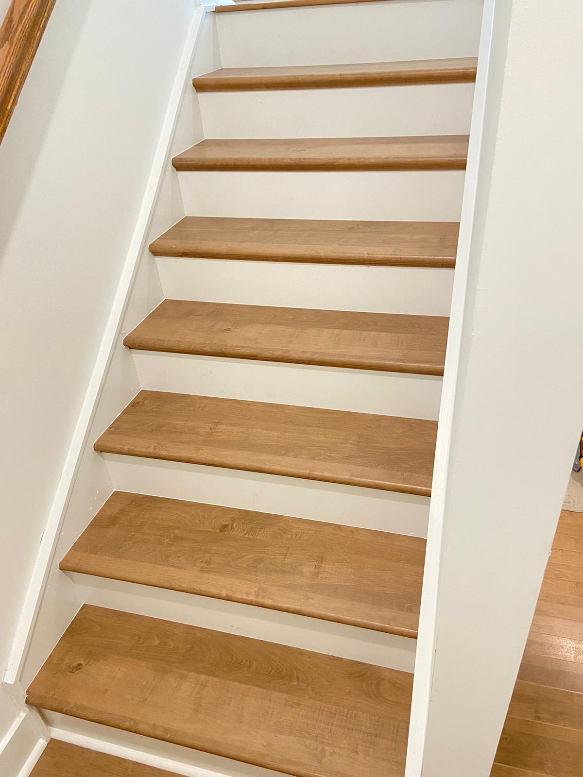 Light oak treads with crisp white risers